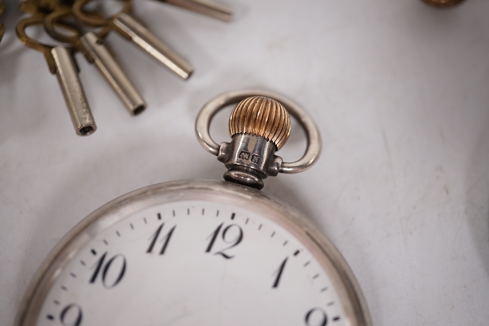 Three early to mid 20th century silver open faced pocket watches, with Roman or Arabic dials and subsidiary seconds, including two keyless and one key wind (Admiral Tacy Watch Co), together with one smaller silver open f